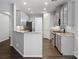Kitchen with granite counters, stainless steel appliances, and a view to the dining area at 581 Harrison Nw Dr, Concord, NC 28027