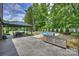 Relaxing backyard with pool, patio, and outdoor kitchen area at 6108 Phyliss Ln, Mint Hill, NC 28227