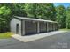 Oversized four-car garage providing ample parking and storage at 6108 Phyliss Ln, Mint Hill, NC 28227