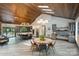 Large open concept space with dining and seating adjacent to kitchen and butler's pantry at 6108 Phyliss Ln, Mint Hill, NC 28227