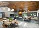 Spacious living area with dining area adjacent to the gourmet kitchen, access to backyard, and cozy seating at 6108 Phyliss Ln, Mint Hill, NC 28227