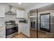 Modern kitchen with stainless steel appliances and ample counter space at 6301 Vernedale Rd, Charlotte, NC 28212