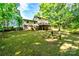 Backyard featuring a patio and an upper-level deck at 6766 Little Mountain Rd, Sherrills Ford, NC 28673