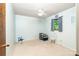 Cozy bedroom with light blue walls, carpeted floors, and a ceiling fan at 6766 Little Mountain Rd, Sherrills Ford, NC 28673