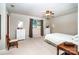 Spacious bedroom featuring neutral colors, ceiling fan, and natural lighting at 6766 Little Mountain Rd, Sherrills Ford, NC 28673