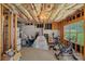 Unfinished basement space with exposed insulation, framing, and a window, offering potential for customization at 7049 Sedgebrook W Dr, Stanley, NC 28164
