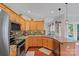 Well-equipped kitchen with granite countertops, stainless steel appliances, and ample cabinet space at 7049 Sedgebrook W Dr, Stanley, NC 28164