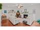 Cozy living room with a fireplace, hardwood floors, and stylish furnishings, perfect for relaxing at 7049 Sedgebrook W Dr, Stanley, NC 28164