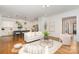 Open-concept living room flowing into a modern kitchen, creating an inviting space at 710 Morgan Park Dr, Charlotte, NC 28204