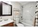 Renovated bathroom with stylish white subway tile and chrome fixtures at 712 Grace Ave, Kannapolis, NC 28083