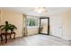Bright bedroom with wood style floors, a decorative mirror and soft natural light at 712 Grace Ave, Kannapolis, NC 28083