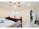 Neutral bedroom with light floors, ceiling fan and closet access, for extra storage at 712 Grace Ave, Kannapolis, NC 28083