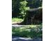 Home exterior with covered front entrance and lush surroundings at 730 Harris Rd, Salisbury, NC 28147