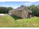 Spacious backyard featuring a well-maintained lawn and an attached two-car garage at 730 Oak Ridge Farms Cir # 14, Newton, NC 28658