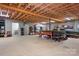 Large unfinished basement offering potential for customization, with open layout and exposed ceiling at 730 Oak Ridge Farms Cir # 14, Newton, NC 28658