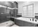 Bathroom featuring a shower with grey tile and a soaking tub at 730 Oak Ridge Farms Cir # 14, Newton, NC 28658