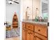 Bathroom vanity featuring a granite countertop and wood cabinets at 730 Oak Ridge Farms Cir # 14, Newton, NC 28658