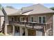 Spacious deck offering a perfect outdoor dining area, complete with a grill and comfortable seating at 730 Oak Ridge Farms Cir # 14, Newton, NC 28658
