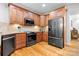 Kitchen featuring stainless steel appliances, light wood cabinets, and hardwood flooring at 730 Oak Ridge Farms Cir # 14, Newton, NC 28658