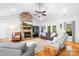 Comfortable living room with stone fireplace, hardwood floors, and plenty of natural light at 730 Oak Ridge Farms Cir # 14, Newton, NC 28658