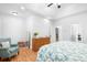 Comfortable main bedroom boasts a sitting area and hardwood floors at 730 Oak Ridge Farms Cir # 14, Newton, NC 28658