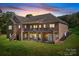 Back of home featuring a brick exterior, a deck on the main level, and walk-out basement at 730 Oak Ridge Farms Cir # 14, Newton, NC 28658
