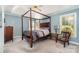 Bedroom with a four-poster bed, neutral carpet, and lots of natural light at 752 Pinebough Ln, Rock Hill, SC 29732
