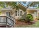 The charming home has a lovely deck with room for outdoor dining and entertaining with mature landscaping at 752 Pinebough Ln, Rock Hill, SC 29732