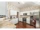 Well-lit kitchen features granite countertops, stainless steel appliances, and white cabinetry at 752 Pinebough Ln, Rock Hill, SC 29732