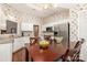 Eat-in kitchen area showcasing stainless steel appliances, dark wood floors, and natural light at 752 Pinebough Ln, Rock Hill, SC 29732