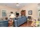 Comfortable living room with a fireplace, bookcase, and ample seating arrangements at 752 Pinebough Ln, Rock Hill, SC 29732