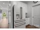 Modern kitchen featuring stainless steel refrigerator, gray countertops, and lots of storage at 7620 Porrera St, Charlotte, NC 28214
