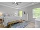 Spacious main bedroom with tray ceilings, ceiling fan, and great natural light at 7620 Porrera St, Charlotte, NC 28214