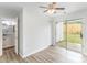 Bedroom showcasing a sliding glass door to the outside and access to a full bathroom at 7718 Petrea Ln, Charlotte, NC 28227