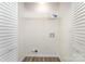 Walk-in closet with shelving and hookups, offering ample storage space in a well-lit area at 7718 Petrea Ln, Charlotte, NC 28227