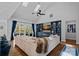 Bright living room with vaulted ceilings, a fireplace, and a built-in entertainment center at 7730 Burning Ridge Dr, Stanley, NC 28164