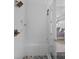 Contemporary shower with white subway tile, a glass door, bench, bronze showerhead, and view to main bedroom at 7730 Burning Ridge Dr, Stanley, NC 28164