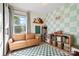 Playroom with a cozy tan couch, natural light and fun decor at 808 Sharon Dr, Waxhaw, NC 28173