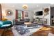 Cozy living room with a sofa, a chair, a coffee table, and nice decor on the walls at 808 Sharon Dr, Waxhaw, NC 28173