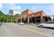 Classic brick buildings with multiple storefronts, showcasing the vibrant atmosphere of downtown Mebane at 808 Sharon Dr, Waxhaw, NC 28173