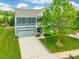 Two-story home with a two-car garage, lush lawn, and mature landscaping in quiet neighborhood at 9109 Loch Glen Way, Charlotte, NC 28278