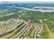 Aerial view of the community featuring a lake nearby with neighborhood location at 9109 Loch Glen Way, Charlotte, NC 28278