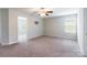 Large, bright bedroom with neutral walls and plush carpet at 9109 Loch Glen Way, Charlotte, NC 28278