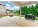 Spacious patio with green backyard, ideal for outdoor gatherings and relaxation at 9109 Loch Glen Way, Charlotte, NC 28278