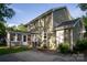 Rear of house showing sunroom at 9801 Kent Village Dr, Charlotte, NC 28269