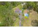 An aerial view showcases the house, in-ground pool, and lush landscaping at 1009 Catawba Valley Se Blvd, Hickory, NC 28602