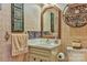 Stylish bathroom with decorative mirror, earthy fixtures, and a unique design for a spa-like experience at 1009 Catawba Valley Se Blvd, Hickory, NC 28602