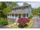 Charming two-story home with a welcoming front porch and beautifully landscaped front yard at 1009 Catawba Valley Se Blvd, Hickory, NC 28602