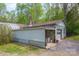 A detached garage offers ample space for parking and storage with an attached shed at 1009 Catawba Valley Se Blvd, Hickory, NC 28602
