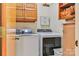 Convenient laundry room featuring modern washer and dryer, ample storage, and functional design at 1009 Catawba Valley Se Blvd, Hickory, NC 28602